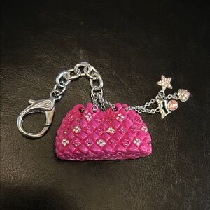Pink bag charm Keychain accessory resembles Chanel iconic bag with blingy Charms
